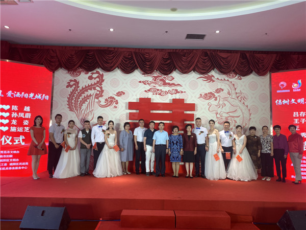 倡樹文明新風(fēng) 愛灑陽(yáng)光城陽(yáng) 城陽(yáng)區(qū)新時(shí)代結(jié)婚禮堂舉辦新式集體婚禮  